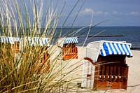 Beach seats in the north sea of Germany. Free public domain CC0 photo.