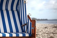 Beach seats in the north sea of Germany. Free public domain CC0 photo.