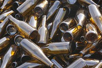 Piles of empty glass beer bottles. Free public domain CC0 photo