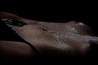 Water droplets on woman's body.  FRee public domain CC0 photo.