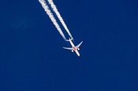 Airplane flying in the sky. Free public domain CC0 photo.