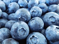 Closeup on pile of fresh blueberries. Free public domain CC0 image. 