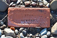 Stone block on rocks. Free public domain CC0 photo.