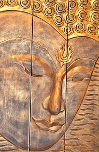 Golden Buddha wall craving. Free public domain CC0 photo.