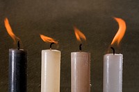 Burning candle in the dark. Free public domain CC0 image.