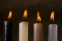 Burning candle in the dark. Free public domain CC0 image.