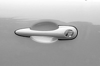 White car door handle. Free public domain CC0 photo.