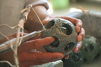 Craftsman carving in stone. Free public domain CC0 photo.