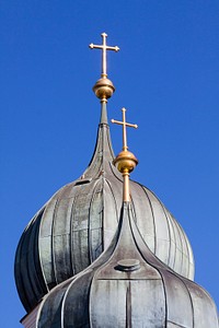 Christian church against blue sky background. Free public domain CC0 photo.