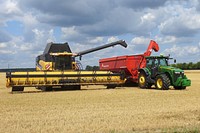 Tractor in a farm. Free public domain CC0 photo