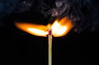 Flame on matching stick. Free public domain CC0 photo.