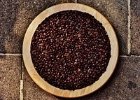 Roasted coffee beans on a plate. Free public domain CC0 photo