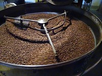 Fresh coffee beans in roasting machine. Free public domain CC0 photo