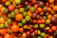 Pile of fresh tri color cherry tomatoes. Free public domain CC0 image.