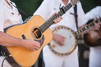 Musician playing guitar, music background.Free public domain CC0 photo.