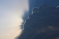 Cloudy sky with sunbeam background. Free public domain CC0 image.