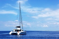 Yacht sailing in the sea. Free public domain CC0 photo.