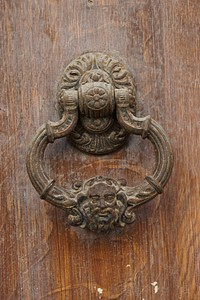 Decorative door knocker. Free public domain CC0 photo.