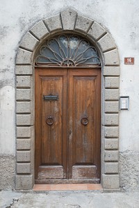 Arched wooden door, architecture. Free public domain CC0 photo.