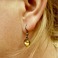 Crystal earring on woman. Free public domain CC0 photo.