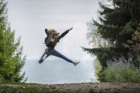 Free girl enjoy jumping outdoors image, public domain people CC0 photo.