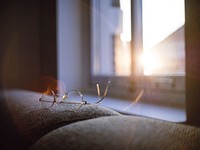 Close up of Reading Glasses kept near window. Free public domain CC0 photo.