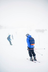 Free people skiing down a mountain photo, public domain sport CC0 image.