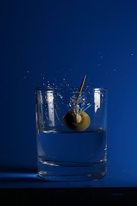 Cocktail drink with olive. Free public domain CC0 image