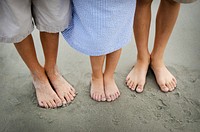 Family on beach vacation. Free public domain CC0 photo.