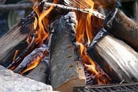 Fire background, burning firewood. Free public domain CC0 image.