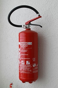 Fire extinguisher, emergency equipment. Free public domain CC0 photo.