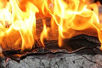 Fire background, burning firewood. Free public domain CC0 image.