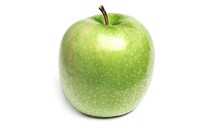 Closeup on green apple on white background. Free public domain CC0 photo.