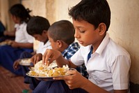 Children eating school lunch, India - 11 January 2016