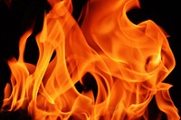 Burning fire, orange background. Free public domain CC0 image.