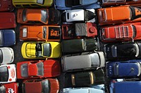 Broken cars waiting to be taken apart. Free public domain CC0 photo.