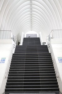 Staircase in white building. Free public domain CC0 photo.