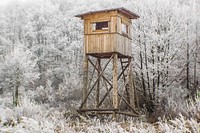 Hunting hut in forest during winter. Free public domain CC0 image.