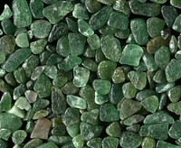 Scattered display of green stones. Free public domain CC0 photo.