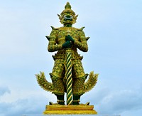 Giant statue in temple of the emerald. Free public domain CC0 photo.