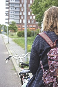 Girl biking. Free public domain CC0 photo.