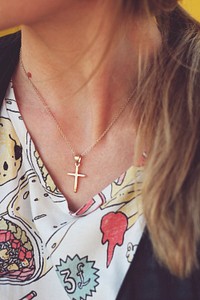 Woman wearing Christian cross. Free public domain CC0 photo.