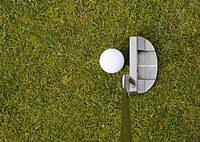 Closeup on golf club head and ball in grass. Free public domain CC0 image. 