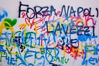 Colorful graffiti on wall outdoors. Free public domain CC0 image.