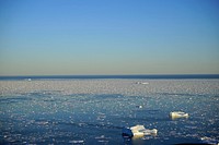 Frozen lake during daytime. Free public domain CC0 image.