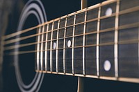 Beautiful acoustic guitar, musical instrument background. Free public domain CC0 photo.