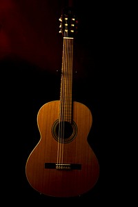 Beautiful acoustic guitar, musical instrument background. Free public domain CC0 photo.