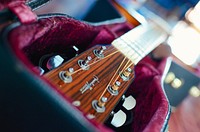 Beautiful acoustic guitar, musical instrument background. Free public domain CC0 photo.