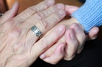 Holding kids hand, close up. Free public domain CC0 photo.