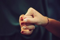 Couple holding hands, close up. Free public domain CC0 photo.